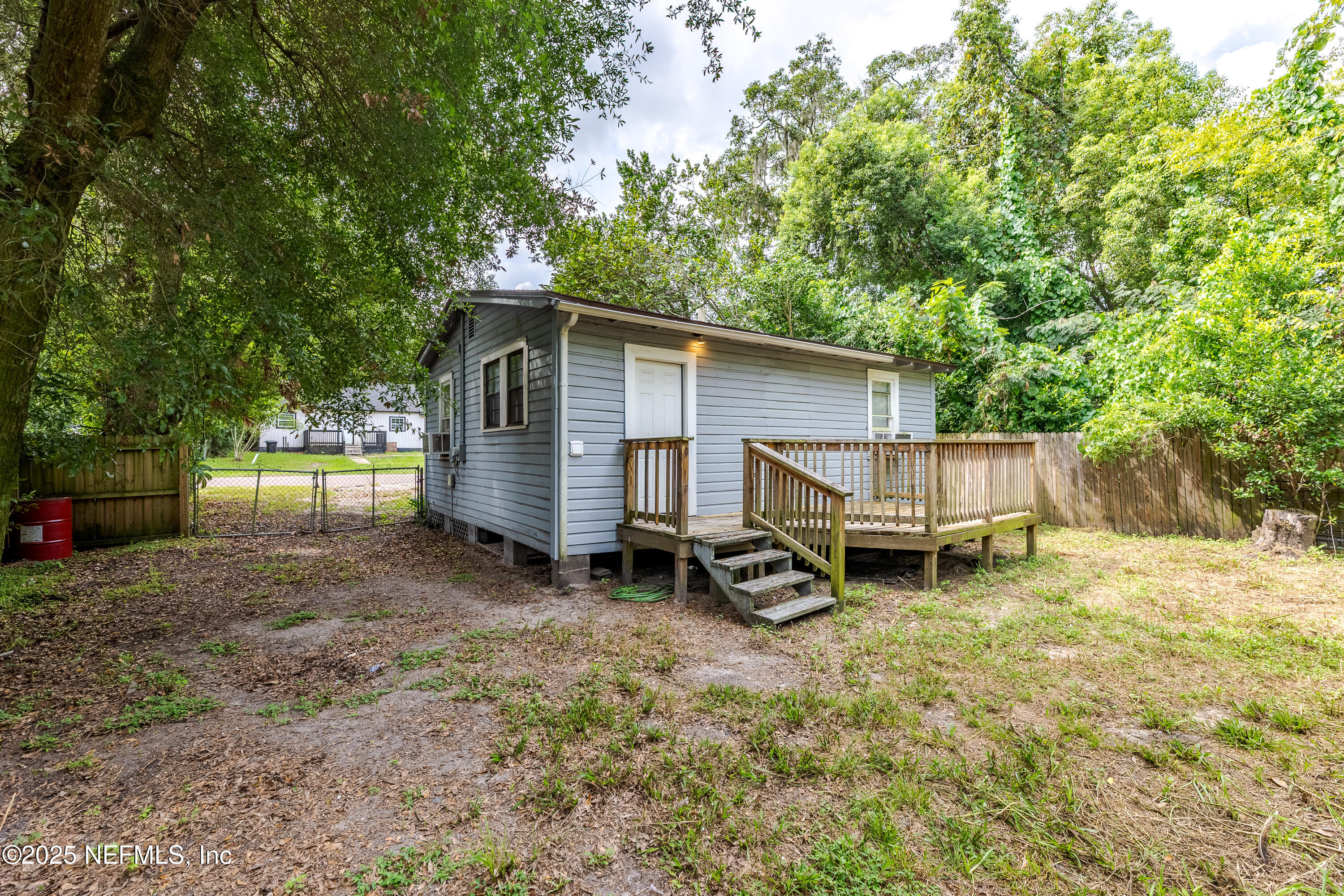 2387 2nd Avenue Jacksonville, FL 32208 - Photo 5 of 20 a view of a house with backyard and chairs