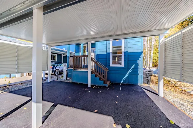 a view of an house with a backyard