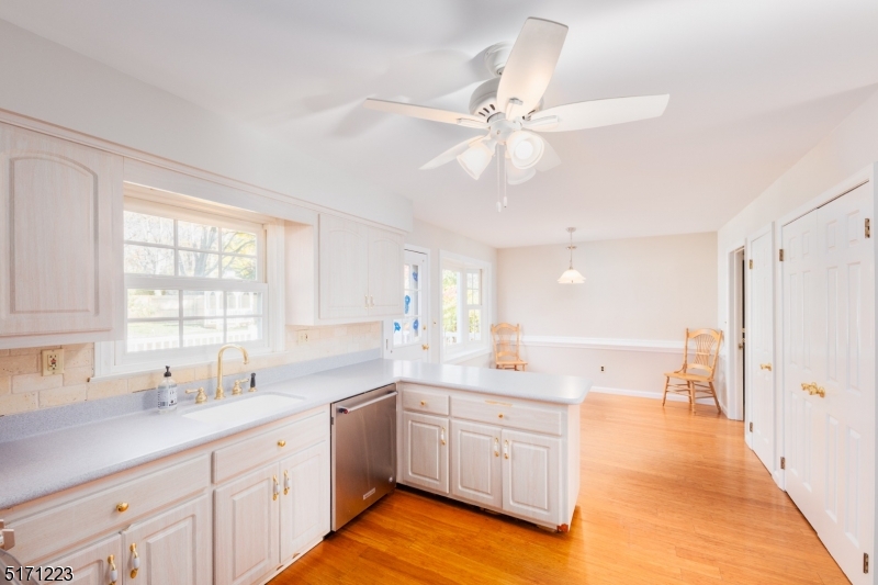 64 Old Coach Road Bernards, NJ 07920 - Photo 12 of 32 a kitchen with a sink cabinets and window