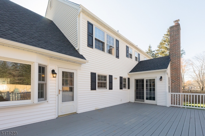 64 Old Coach Road Bernards, NJ 07920 - Photo 27 of 32 a front view of a house with a balcony