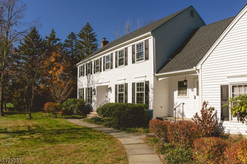 64 Old Coach Road Bernards, NJ 07920 - Photo 5 of 32 a house view with a garden space