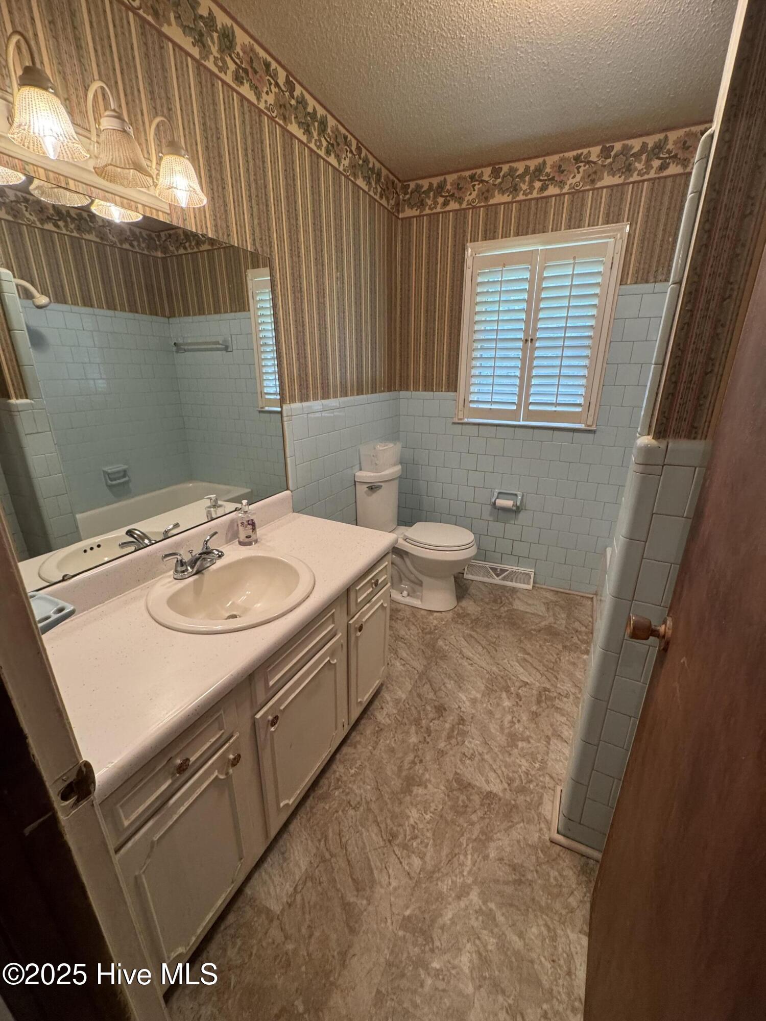4133 Ridgecrest Road Wilson, NC 27893 - Photo 23 of 24 Hall Bathroom