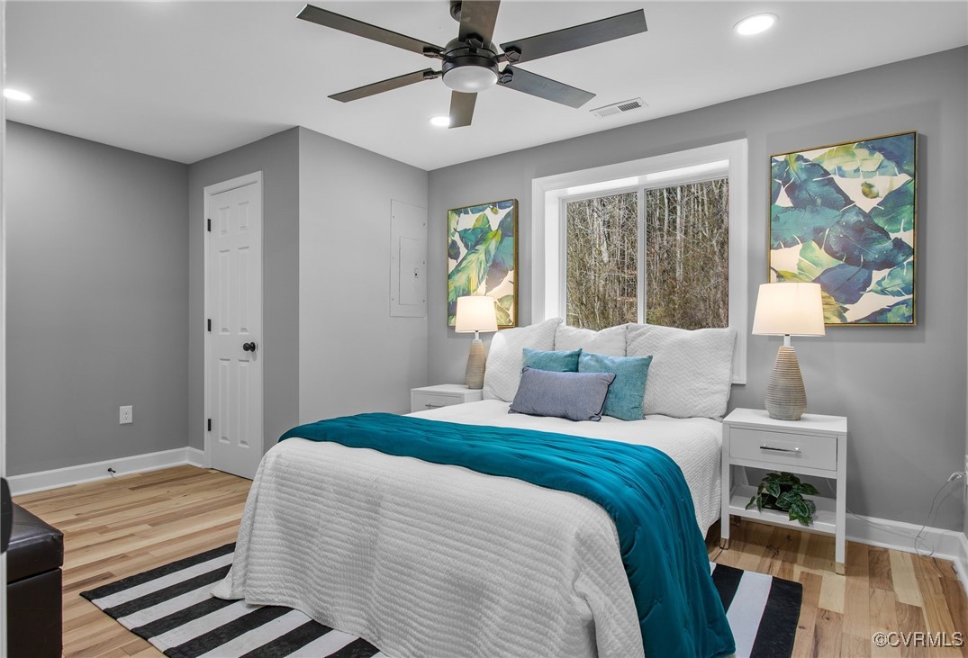 8501 Barnetts Road Charles City, VA 23030 - Photo 17 of 33 Bedroom with recessed lighting, light wood-type fl