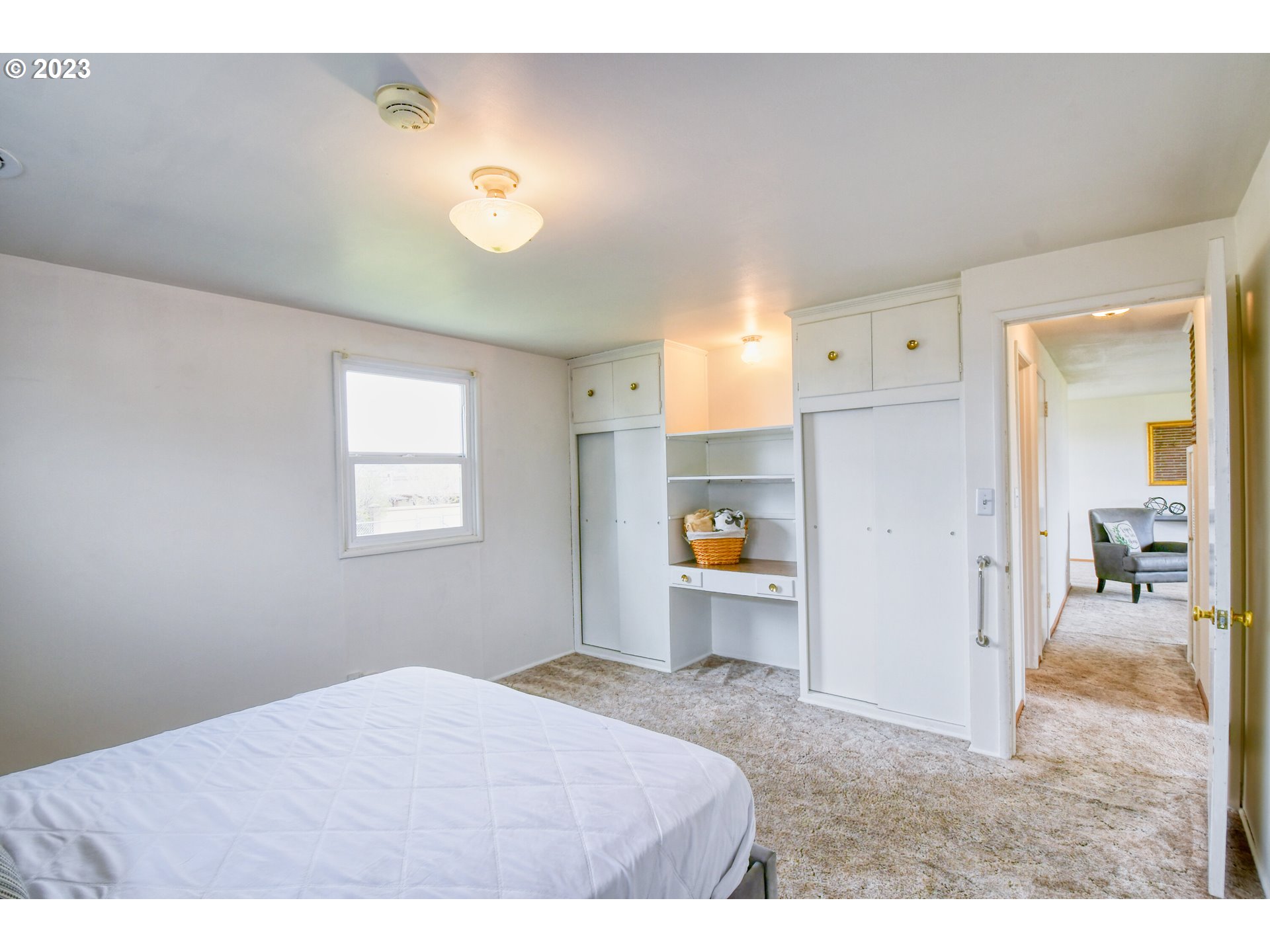 1617 Southwest Hailey Avenue Pendleton, OR 97801 - Photo 13 of 24 a kitchen with a refrigerator and a sink