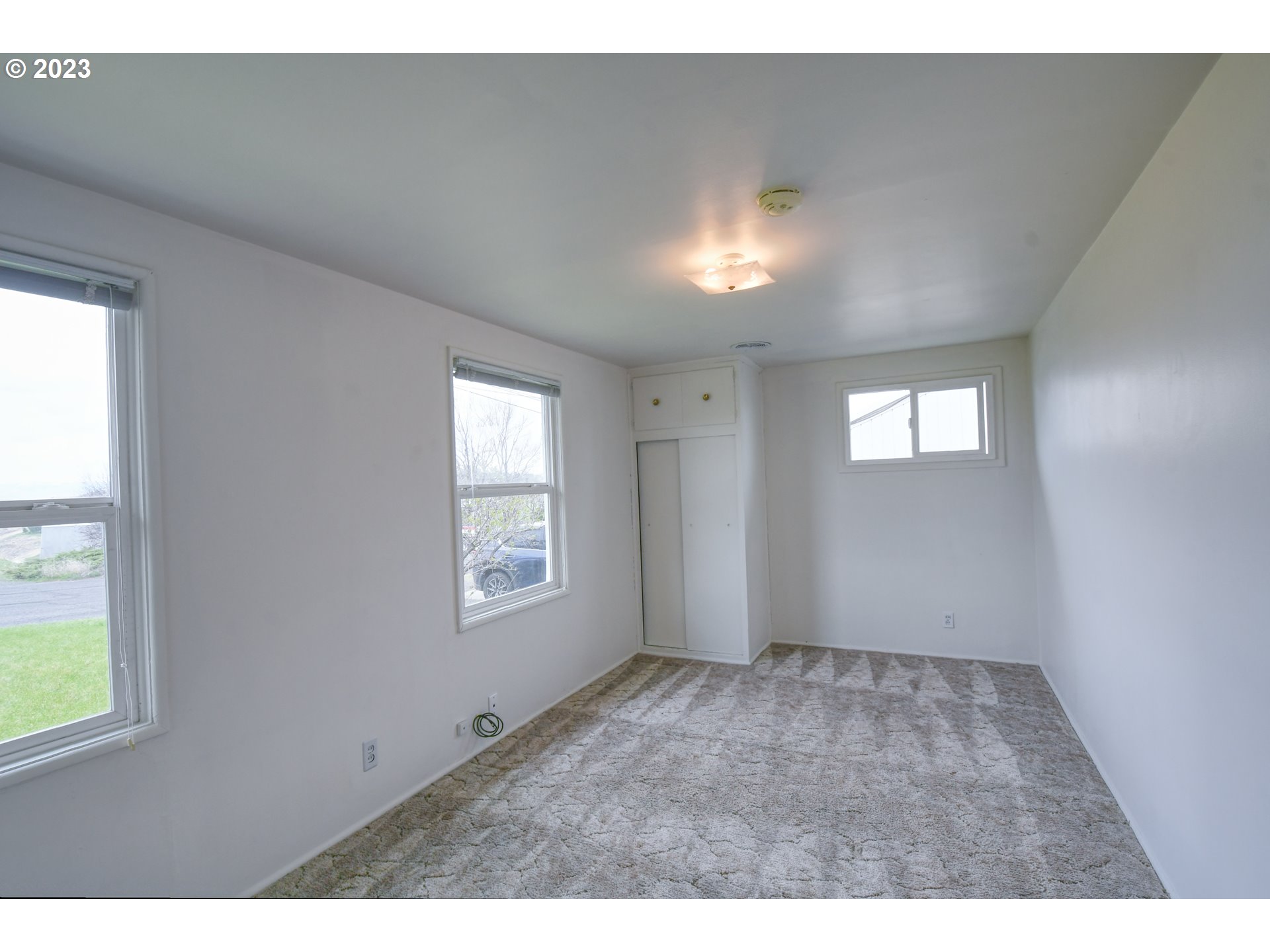 1617 Southwest Hailey Avenue Pendleton, OR 97801 - Photo 15 of 24 a view of an empty room with a window
