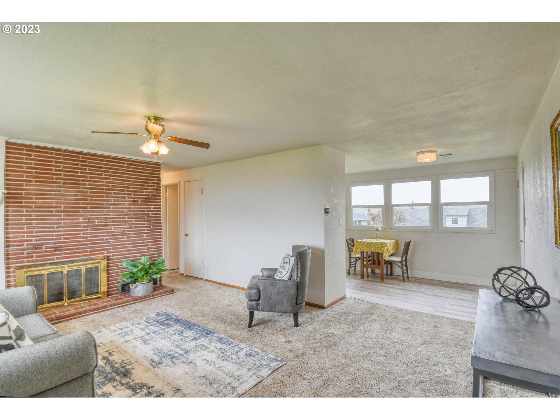 1617 Southwest Hailey Avenue Pendleton, OR 97801 - Photo 5 of 24 a living room with furniture and a table