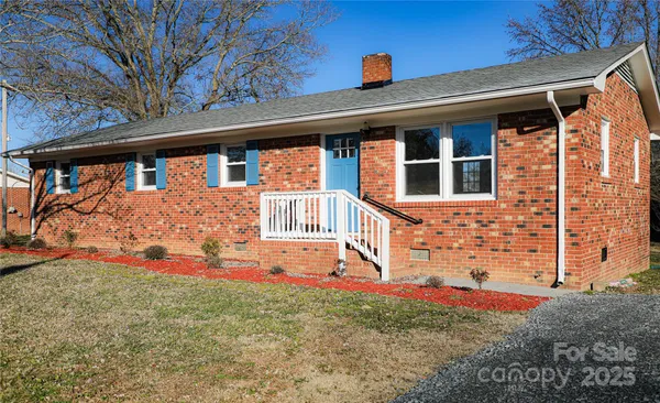 front view of a house with a big yard