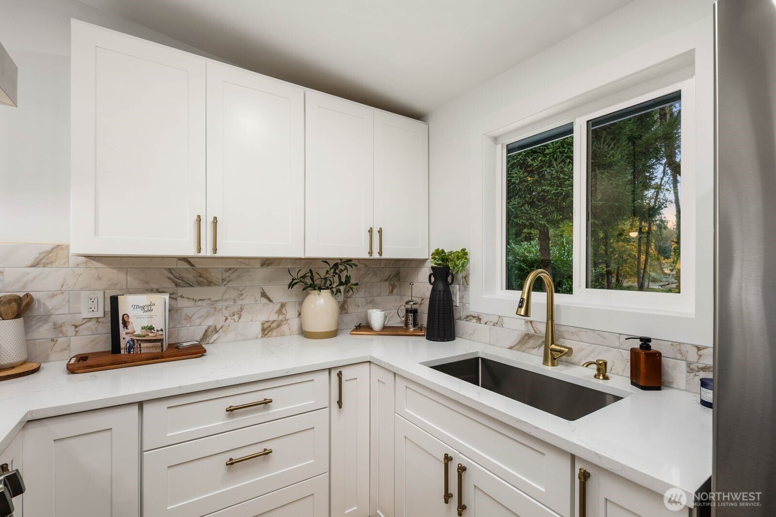 14866 154th Place Southeast Renton, WA 98058 - Photo 13 of 36 a kitchen with a sink and cabinets