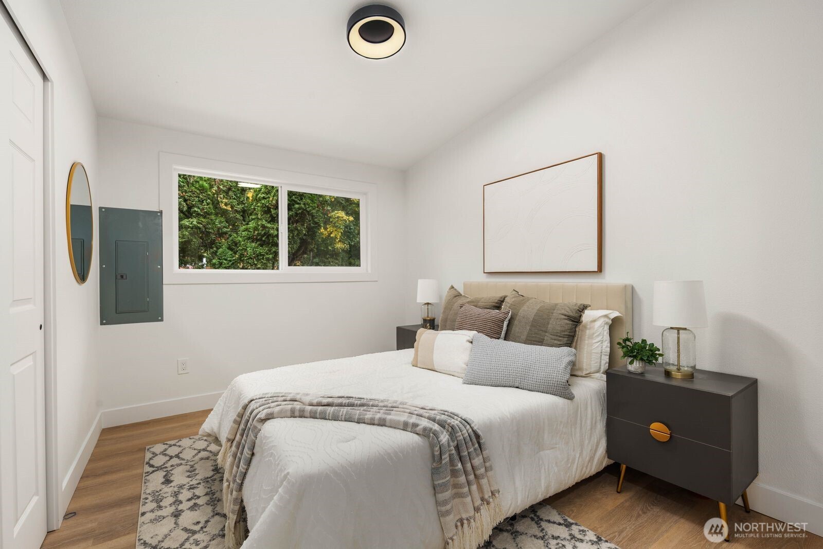 14866 154th Place Southeast Renton, WA 98058 - Photo 15 of 36 a bedroom with a bed and a window