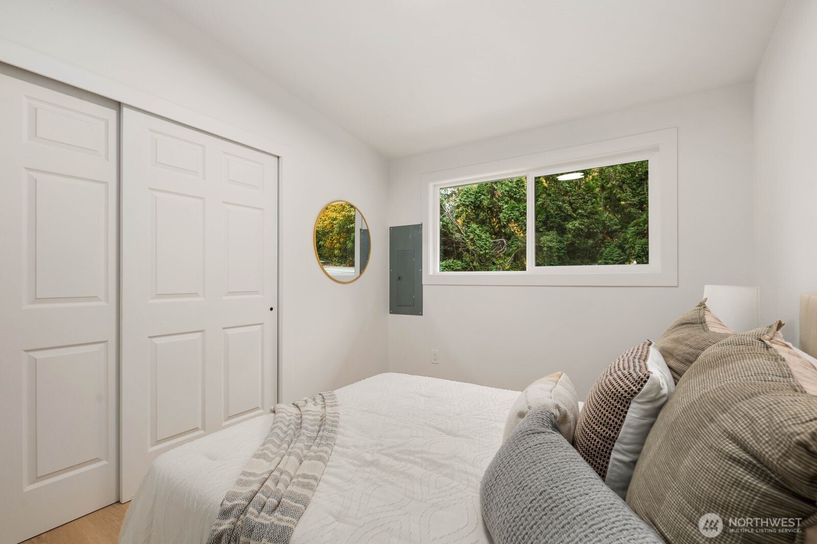 14866 154th Place Southeast Renton, WA 98058 - Photo 16 of 36 a bedroom with a bed and a window