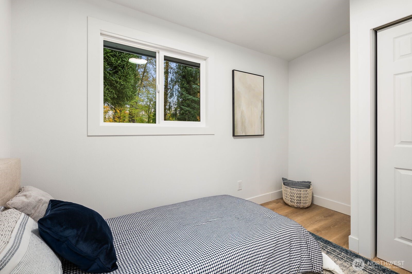 14866 154th Place Southeast Renton, WA 98058 - Photo 18 of 36 a bedroom with a bed and a window