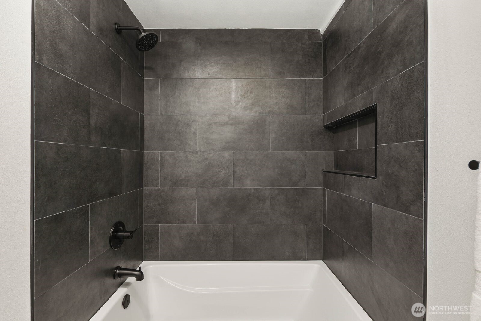 14866 154th Place Southeast Renton, WA 98058 - Photo 20 of 36 a bathroom with a bathtub