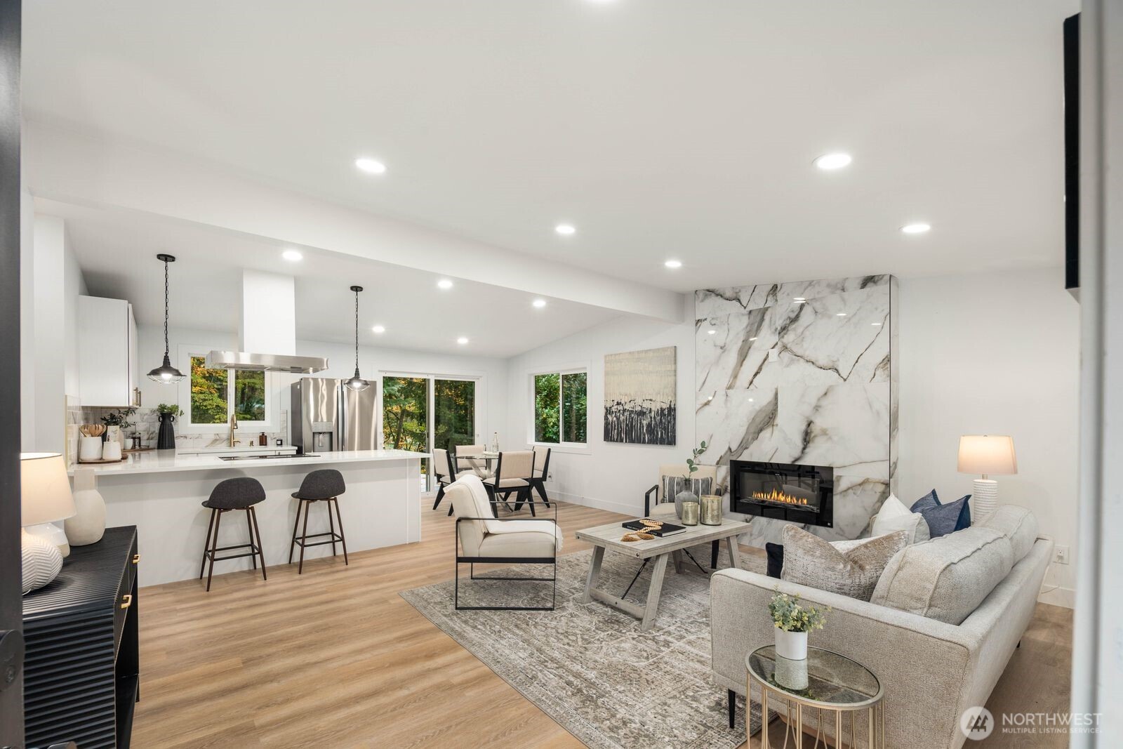 14866 154th Place Southeast Renton, WA 98058 - Photo 4 of 36 a living room with furniture and a wooden floor