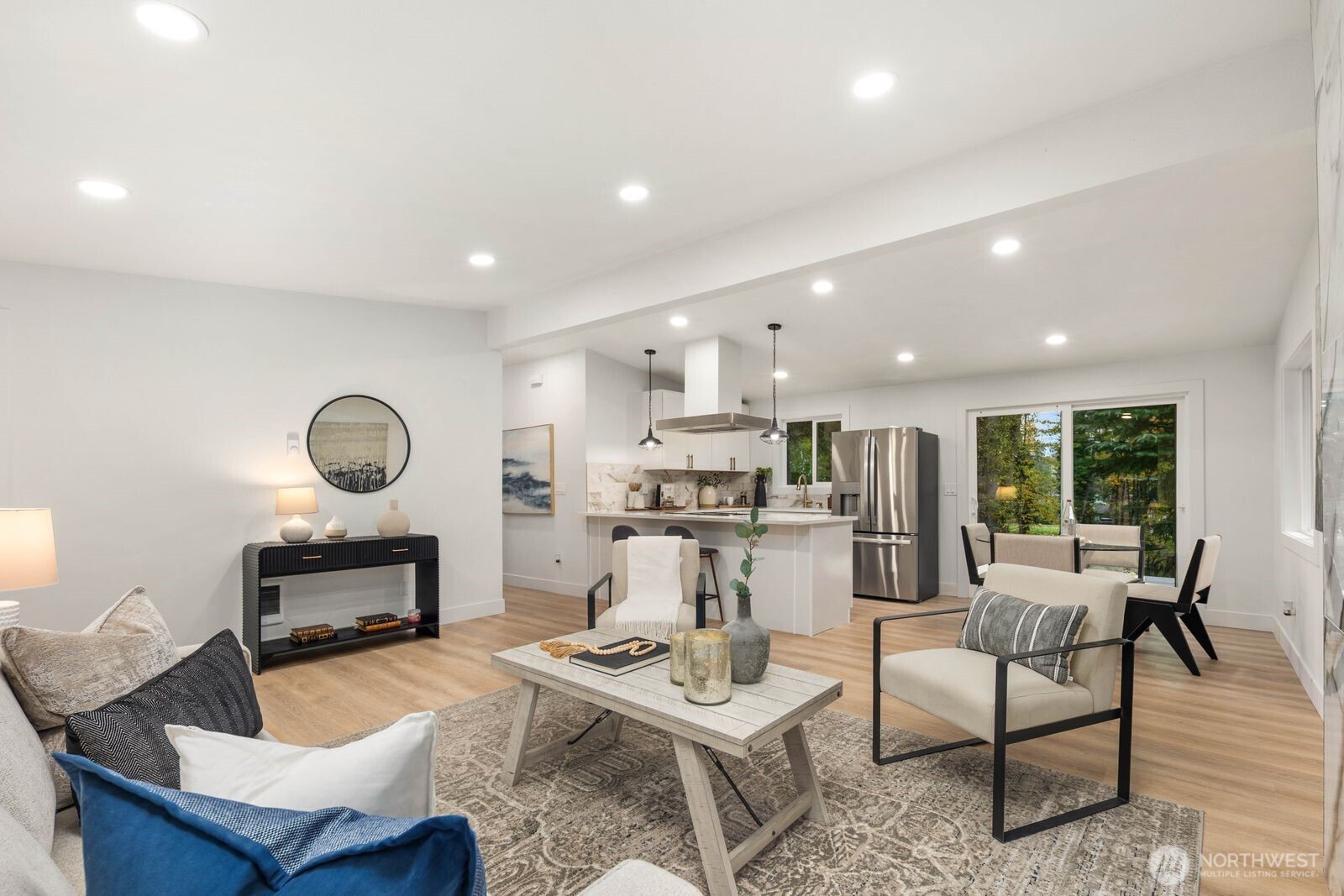 14866 154th Place Southeast Renton, WA 98058 - Photo 8 of 36 a living room with furniture and a wooden floor