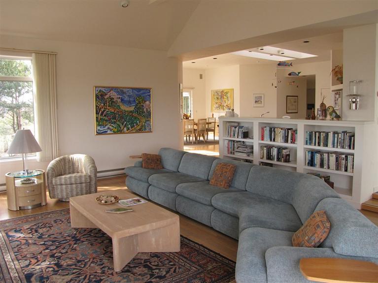 16 Cormorant Road Truro, MA 02666 - Photo 12 of 21 a living room with furniture and a table