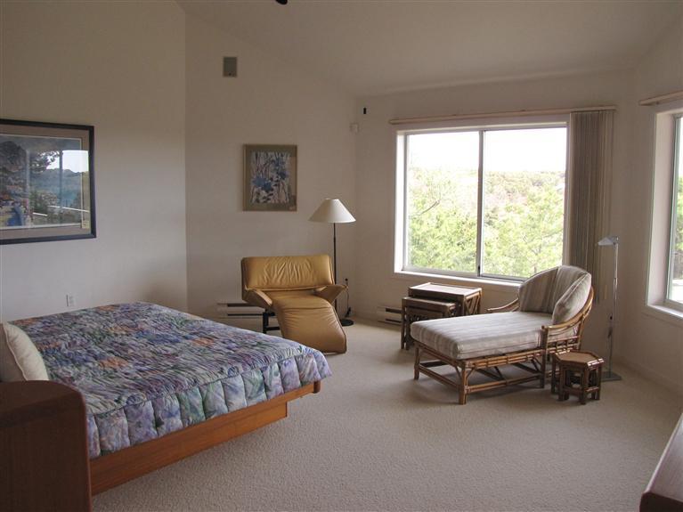 16 Cormorant Road Truro, MA 02666 - Photo 18 of 21 a bedroom with bed and a window