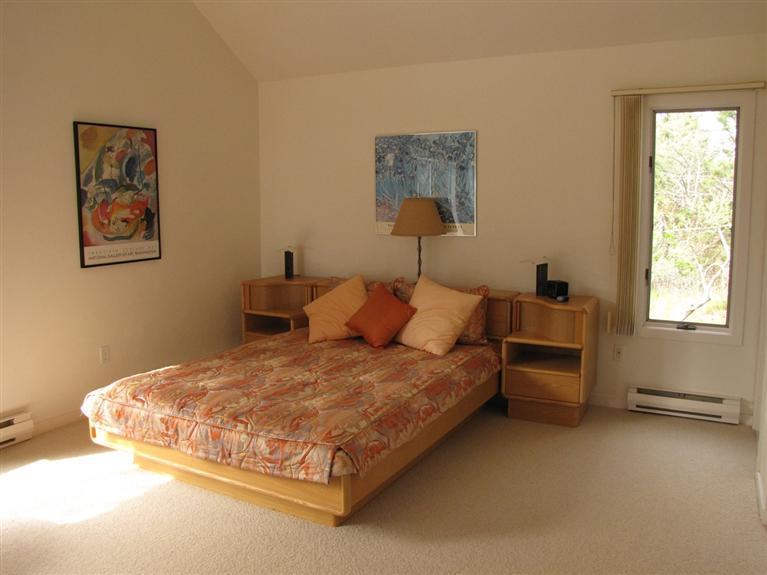16 Cormorant Road Truro, MA 02666 - Photo 21 of 21 a bed sitting in a bedroom next to a window