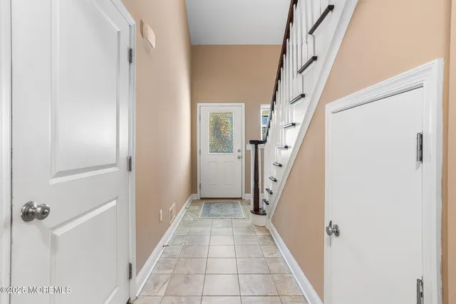 a view of an entryway with hallway
