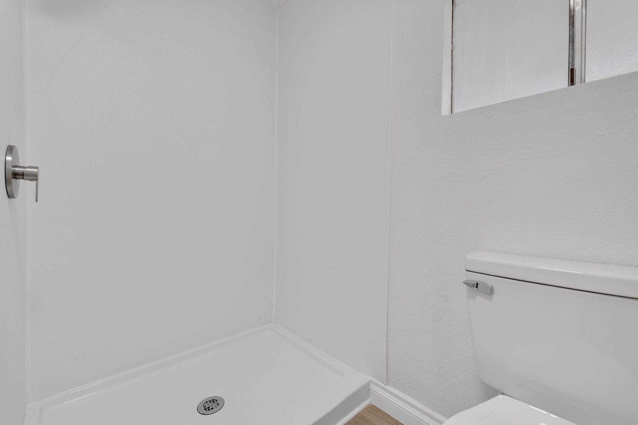 1301 East Avenue I Lancaster, CA 93535 - Photo 15 of 25 a bathroom with a tub
