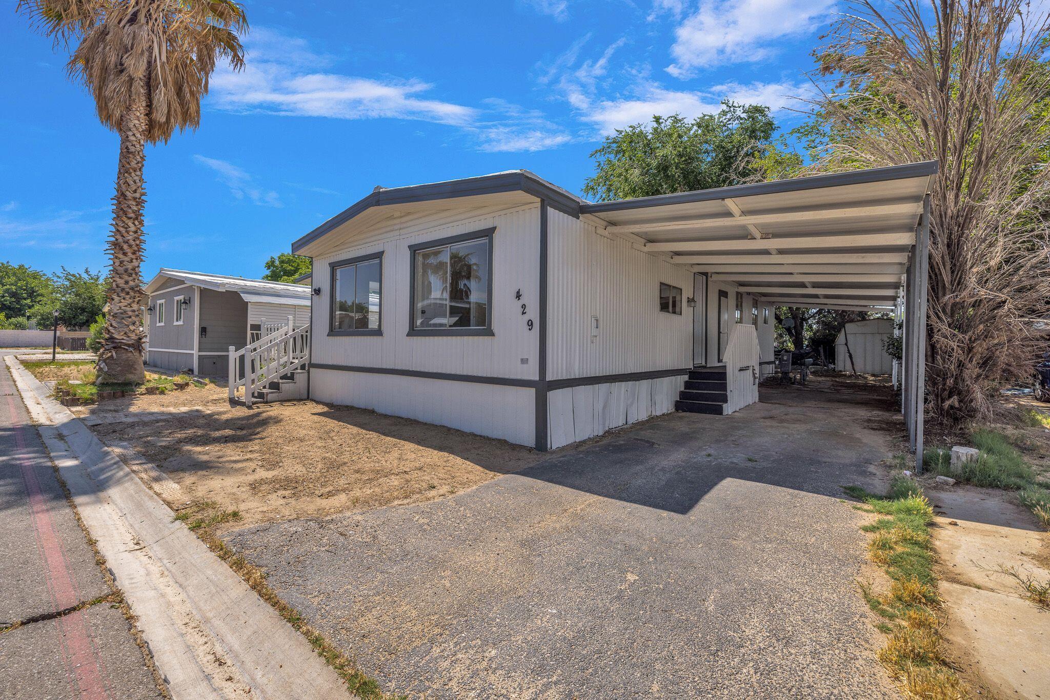 1301 East Avenue I Lancaster, CA 93535 - Photo 20 of 25 a view of a house with a patio