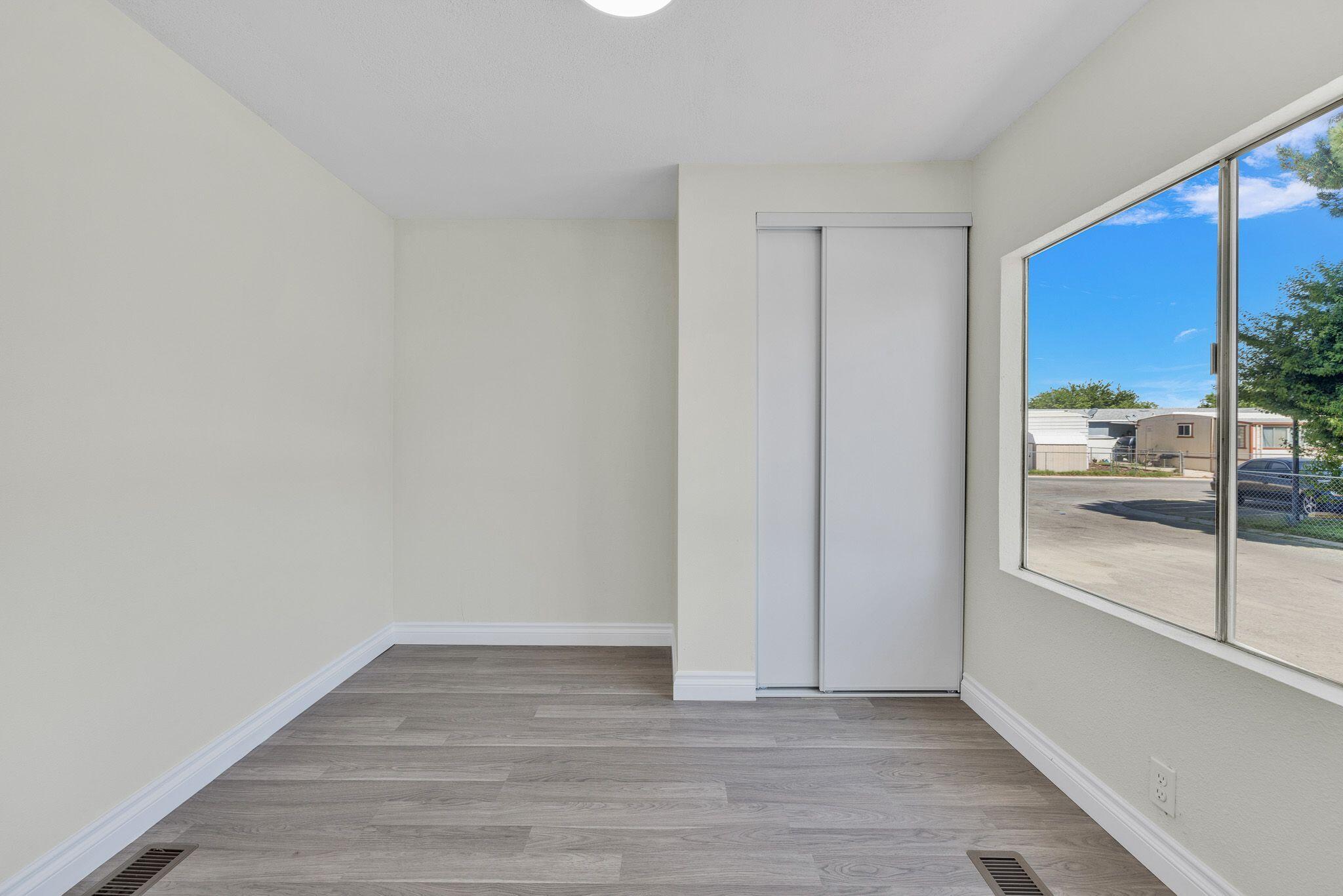1301 East Avenue I Lancaster, CA 93535 - Photo 6 of 25 a view of an empty room and window