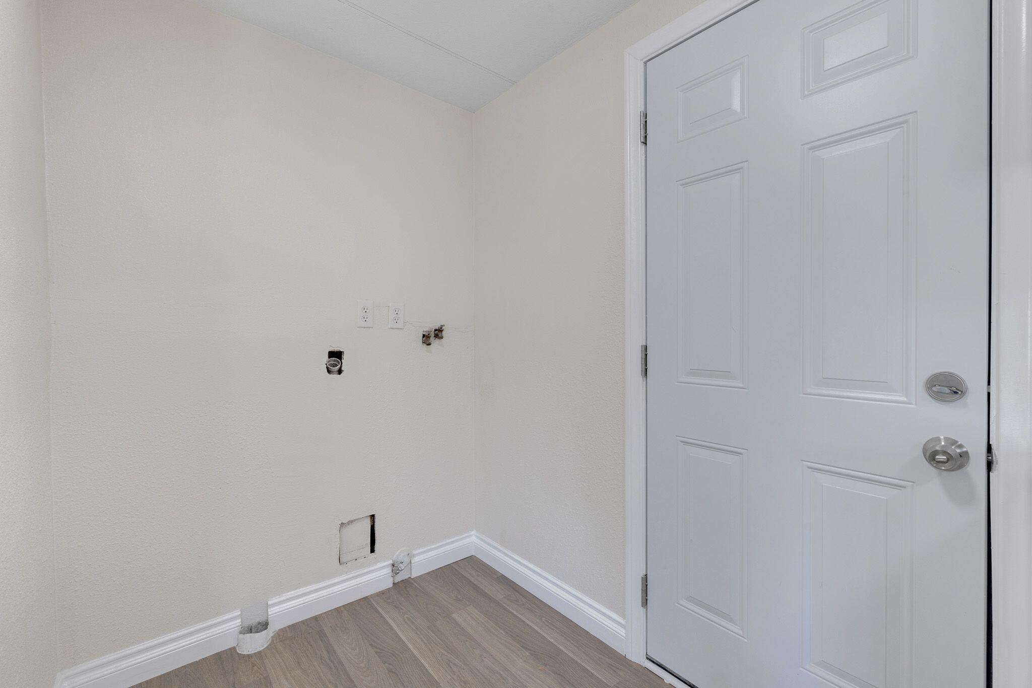 1301 East Avenue I Lancaster, CA 93535 - Photo 8 of 25 a view of small space with racks on the wall