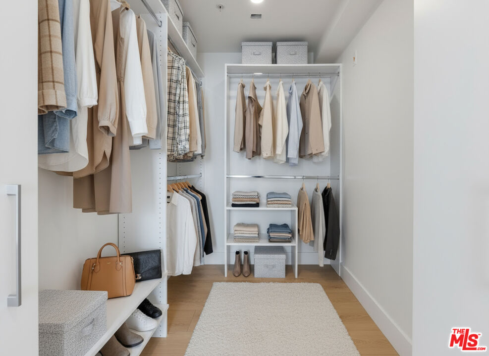 8561 Belmont Street, Unit 4 Cypress, CA 90630 - Photo 20 of 23 a bedroom with furniture and a window