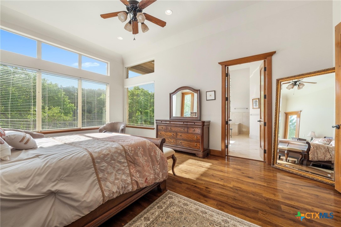4001 Bell Springs Road Dripping Springs, TX 78620 - Photo 21 of 47 Primary Bedroom