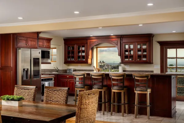 a large kitchen with lots of counter space and window
