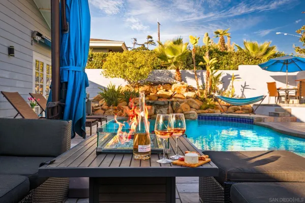 a view of outdoor seating space with wooden floor