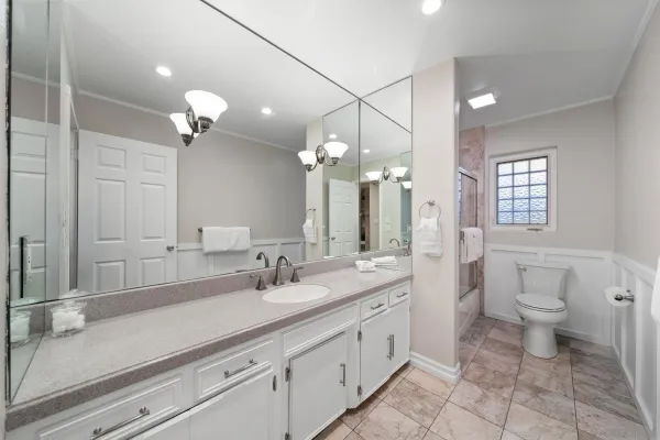 a bathroom with a bathtub and shower