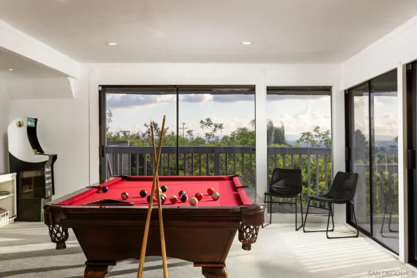 a room with furniture and garden view