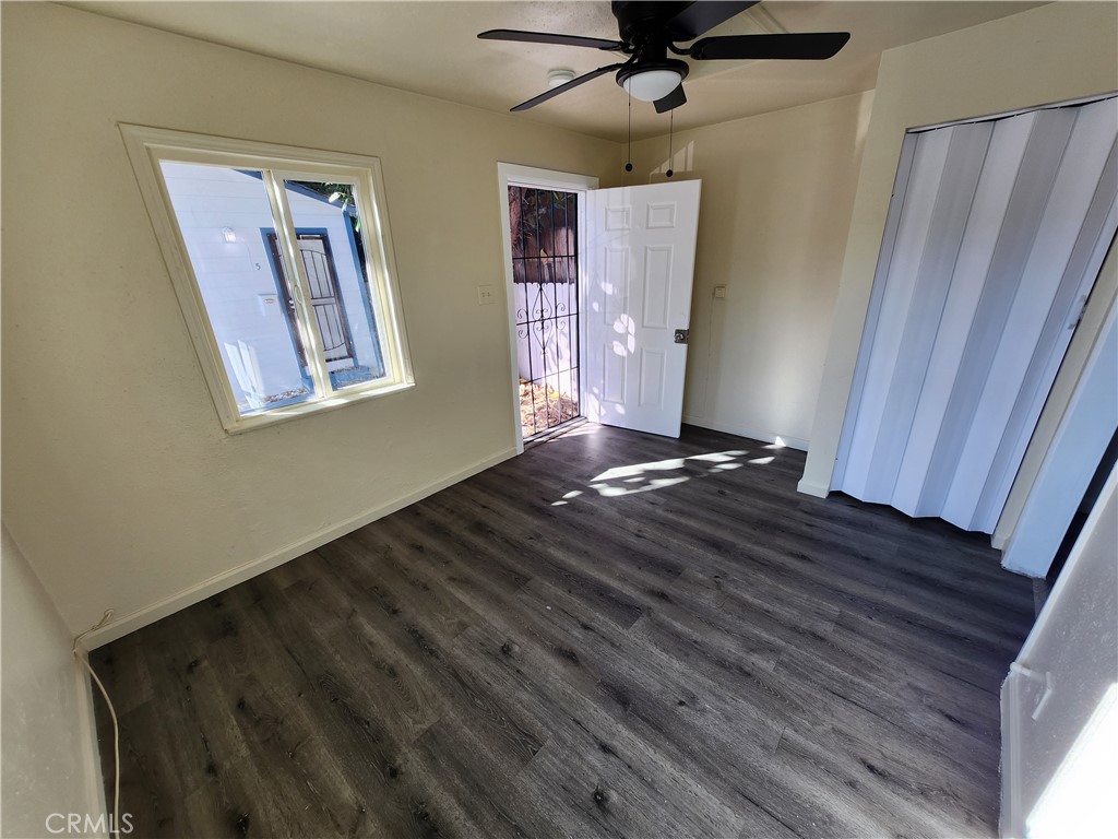 3717 West Imperial Highway, Unit 10 Inglewood, CA 90303 - Photo 3 of 5 a view of room with window and wooden floor