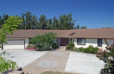 3688 Roblar Road Petaluma, CA 94952 - Photo 1 of 10 front view of a house with a yard