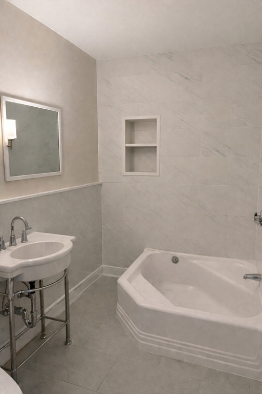 29 Boulevard Road Dedham, MA 02026 - Photo 14 of 34 a white bath tub sitting next to a white sink