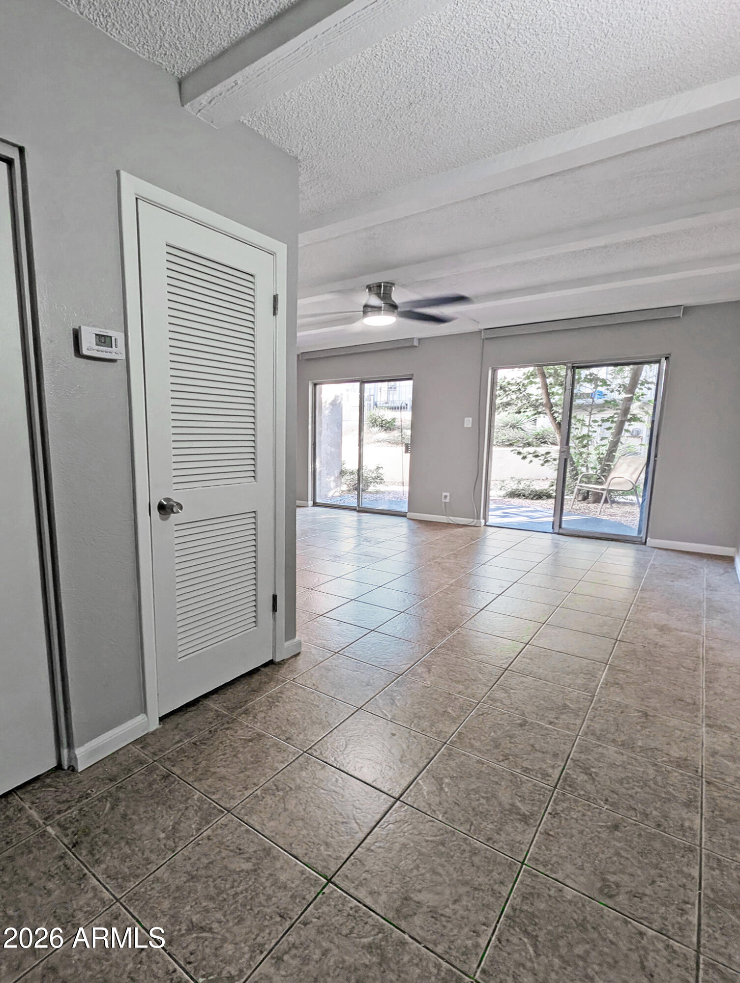 1018 East Osborn Road, Unit A Phoenix, AZ 85014 - Photo 5 of 19 a view of an empty room and window