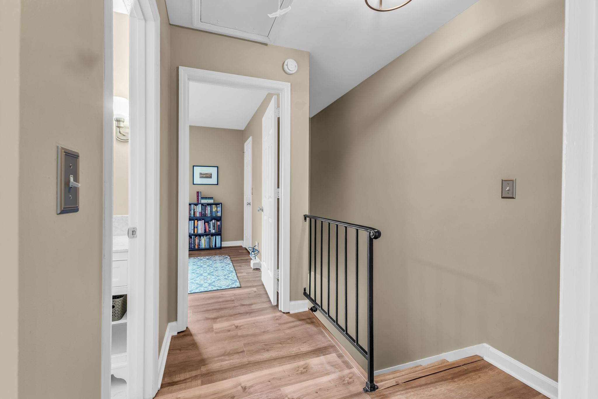 705 Fox Ridge Drive Brentwood, TN 37027 - Photo 19 of 26 a view of a hallway with wooden floor and a hallway