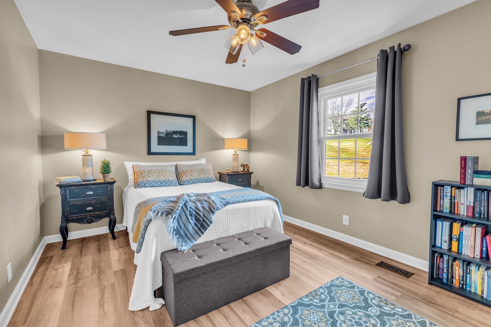 705 Fox Ridge Drive Brentwood, TN 37027 - Photo 25 of 26 a bedroom with a bed furniture and a book shelf
