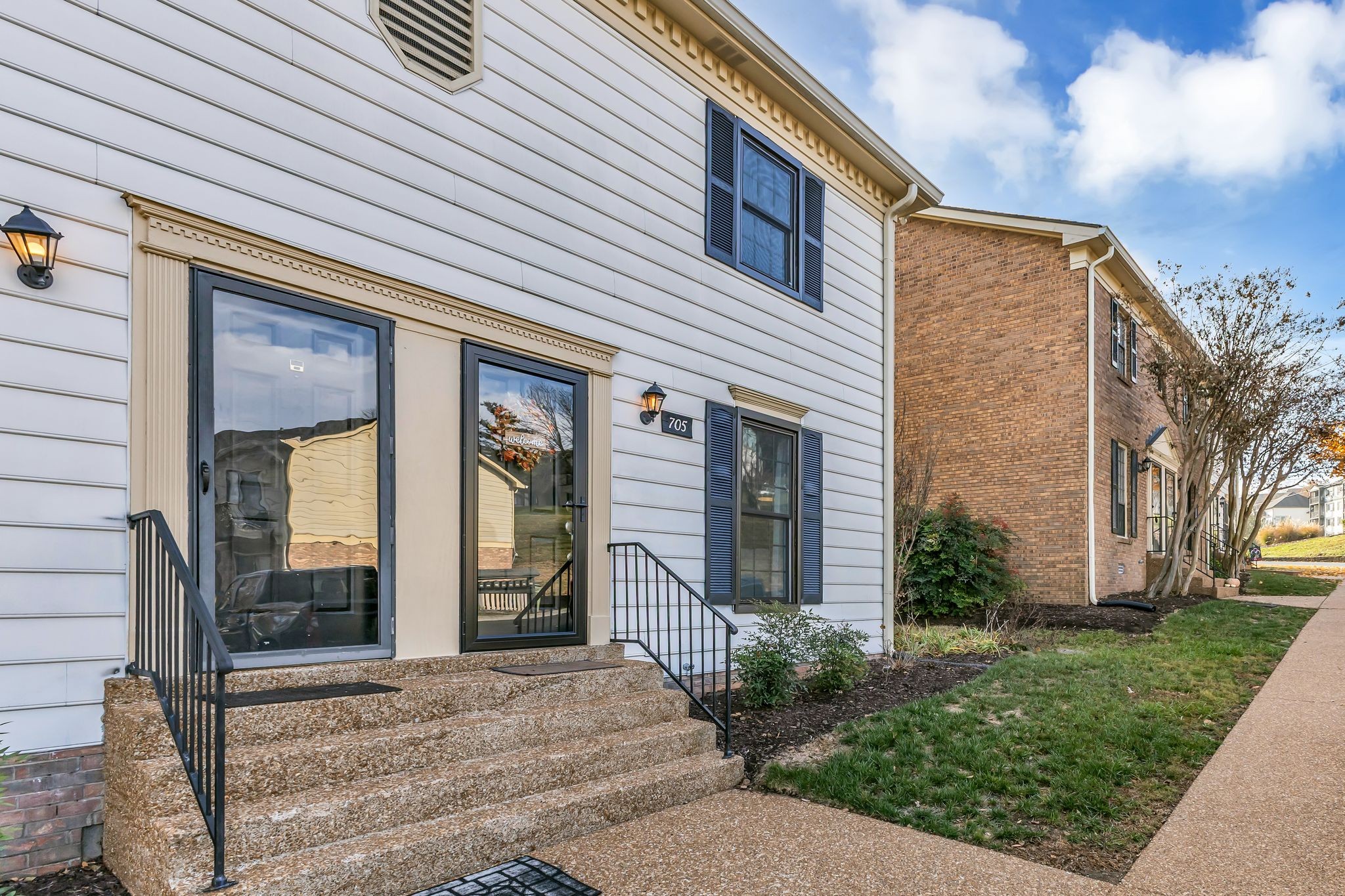 705 Fox Ridge Drive Brentwood, TN 37027 - Photo 4 of 26 a view of a brick house with a large windows