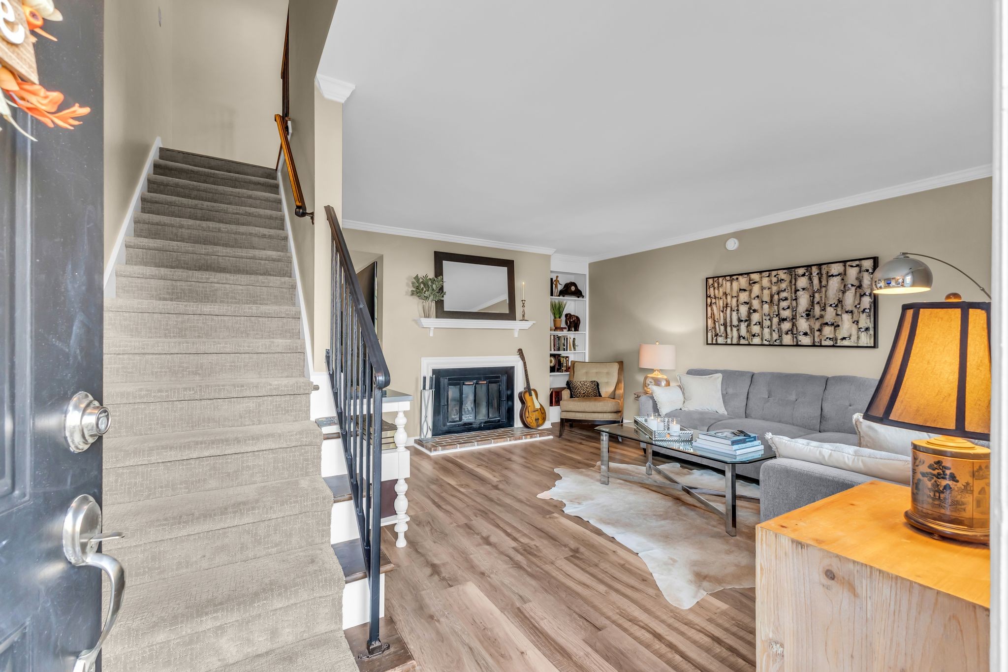 705 Fox Ridge Drive Brentwood, TN 37027 - Photo 5 of 26 a living room with furniture and a fireplace