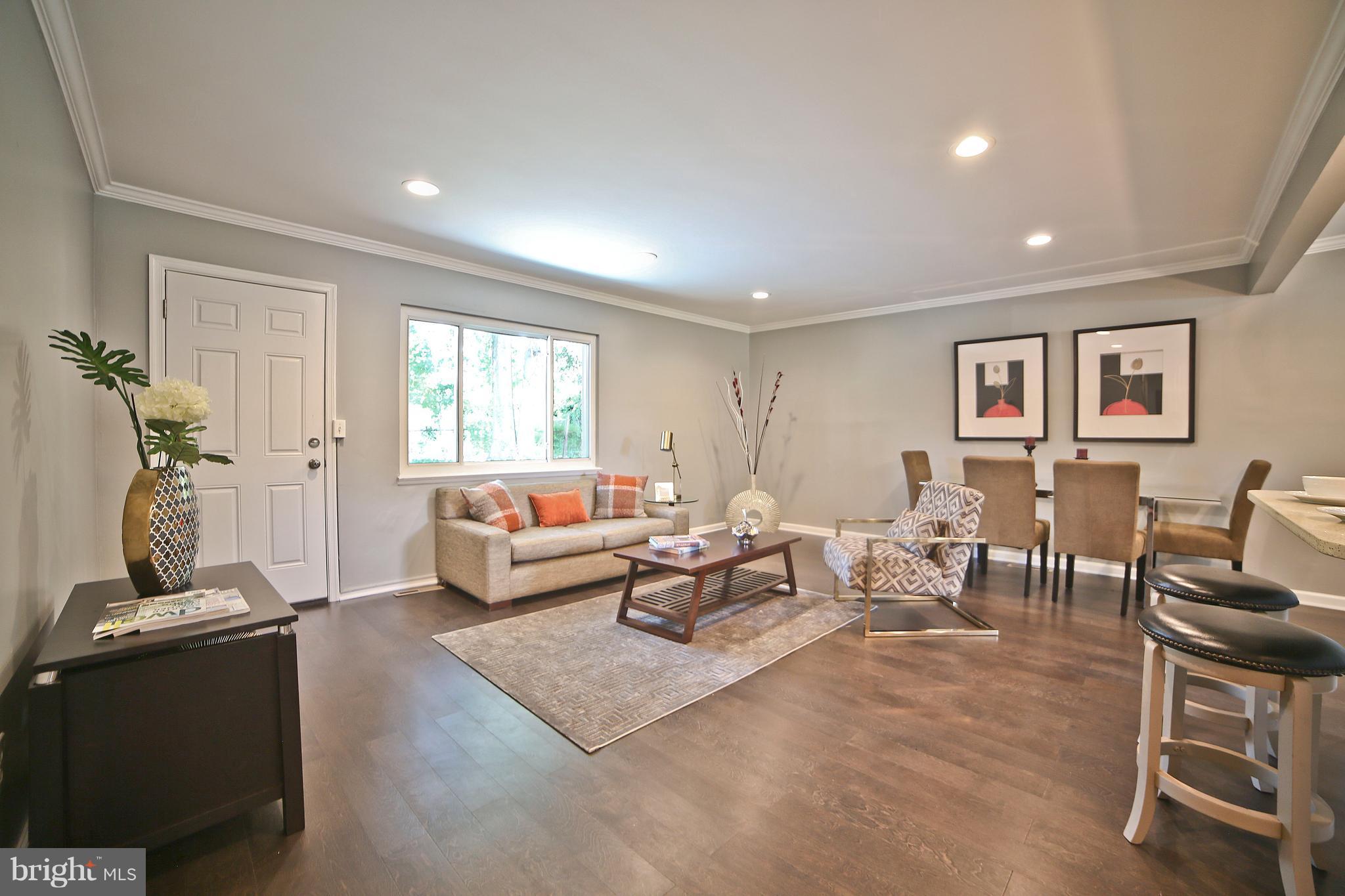6612 Cimarron Street Springfield, VA 22150 - Photo 15 of 30 a living room with furniture and a window