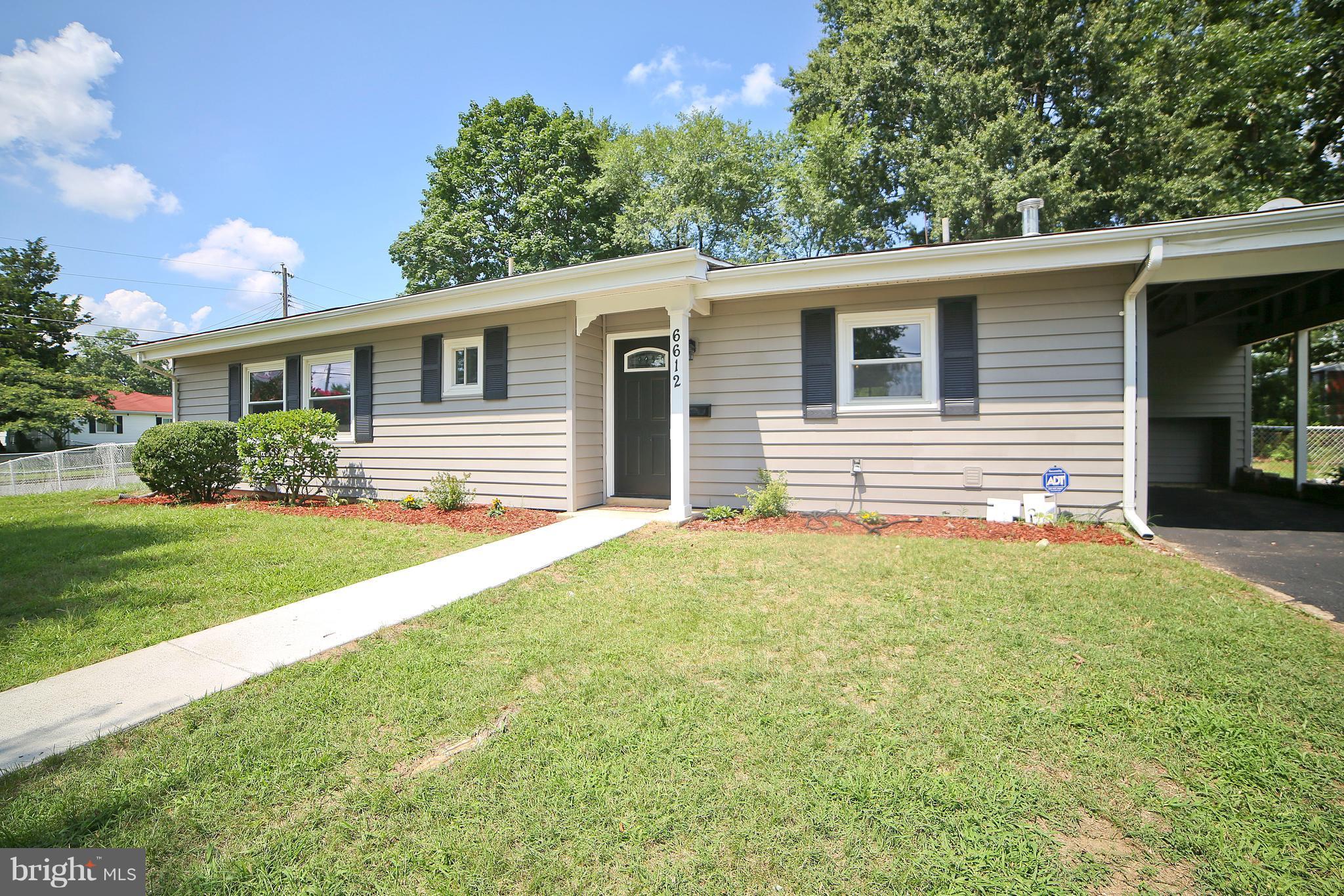 6612 Cimarron Street Springfield, VA 22150 - Photo 29 of 30 a house view with a garden space