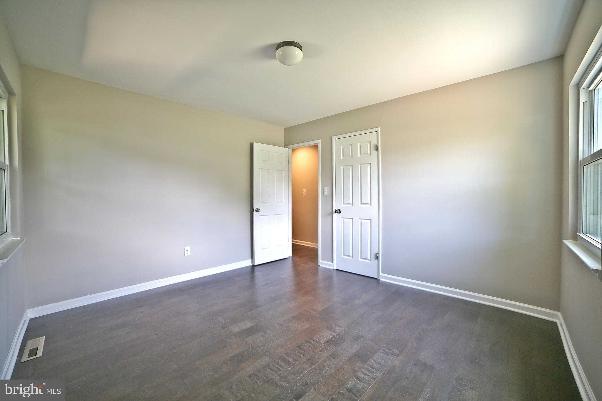 6612 Cimarron Street Springfield, VA 22150 - Photo 8 of 30 an empty room with a natural light