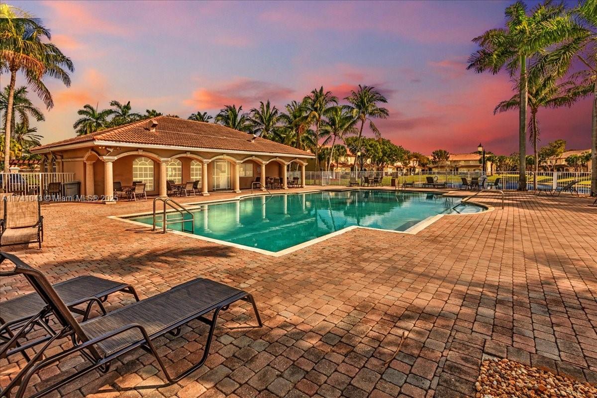 8381 Southwest 26 Th Street, Unit 103 Miramar, FL 33025 - Photo 2 of 62 a view of a house with a yard