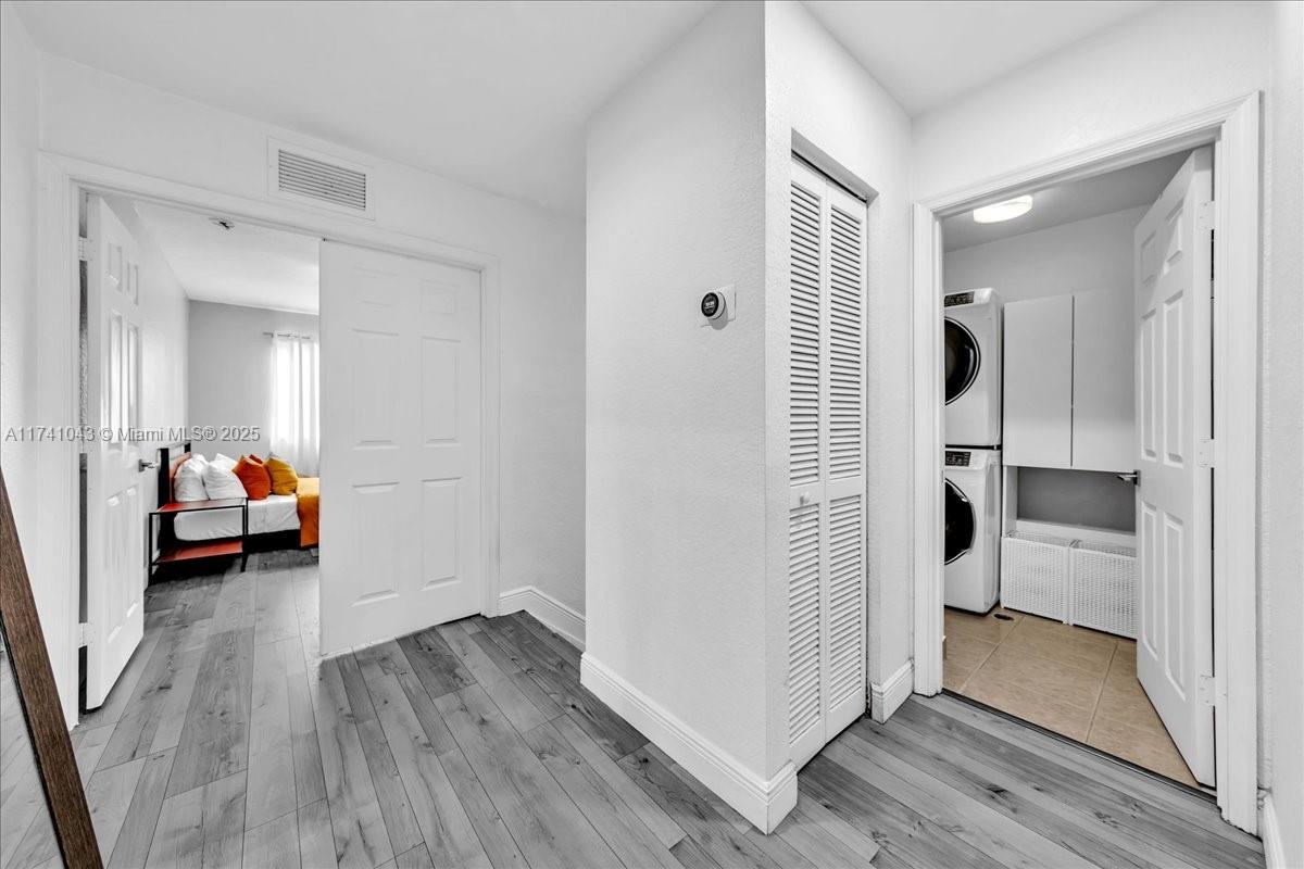 8381 Southwest 26 Th Street, Unit 103 Miramar, FL 33025 - Photo 41 of 62 a view of a room that has a bed and a view of bathroom