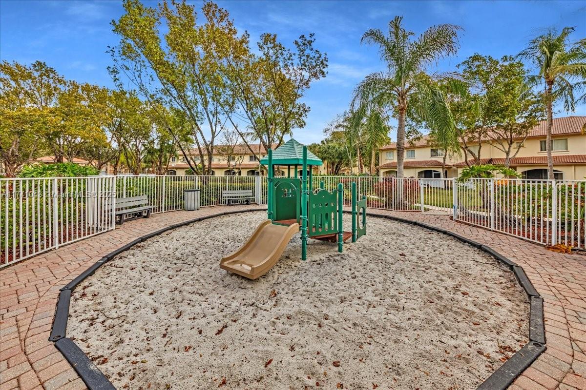 8381 Southwest 26 Th Street, Unit 103 Miramar, FL 33025 - Photo 54 of 62 a view of a park with a slide