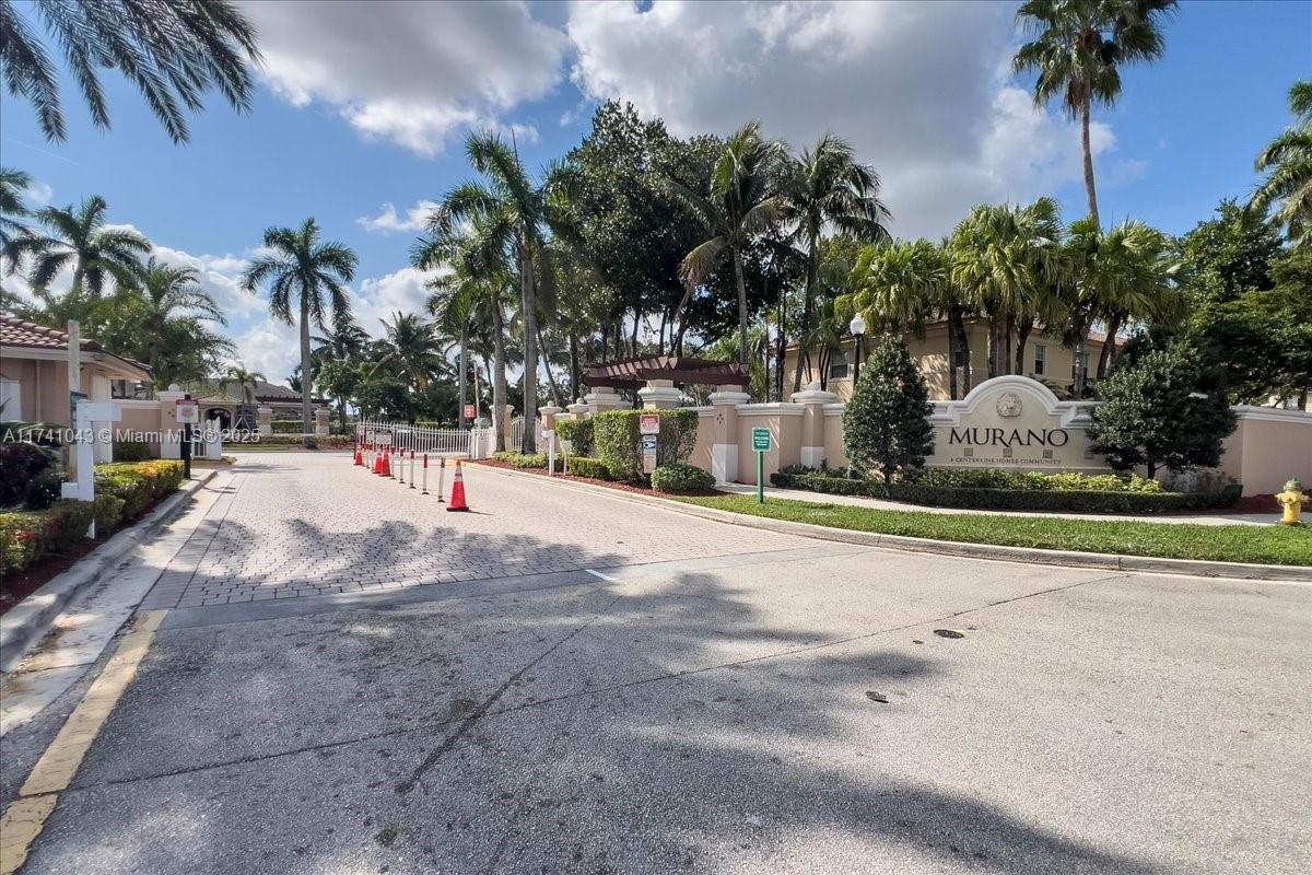8381 Southwest 26 Th Street, Unit 103 Miramar, FL 33025 - Photo 58 of 62 a view of the terrace along with palm trees