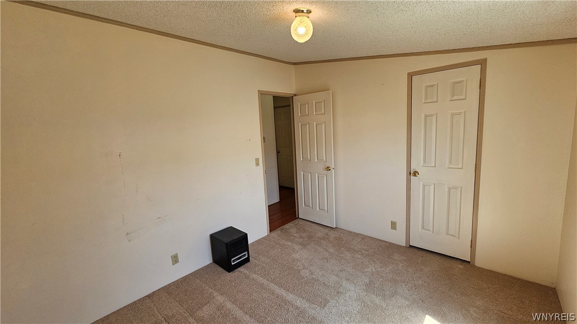 20 Calla Way Cheektowaga, NY 14043 - Photo 23 of 31 Bedroom 2 looking to hallway