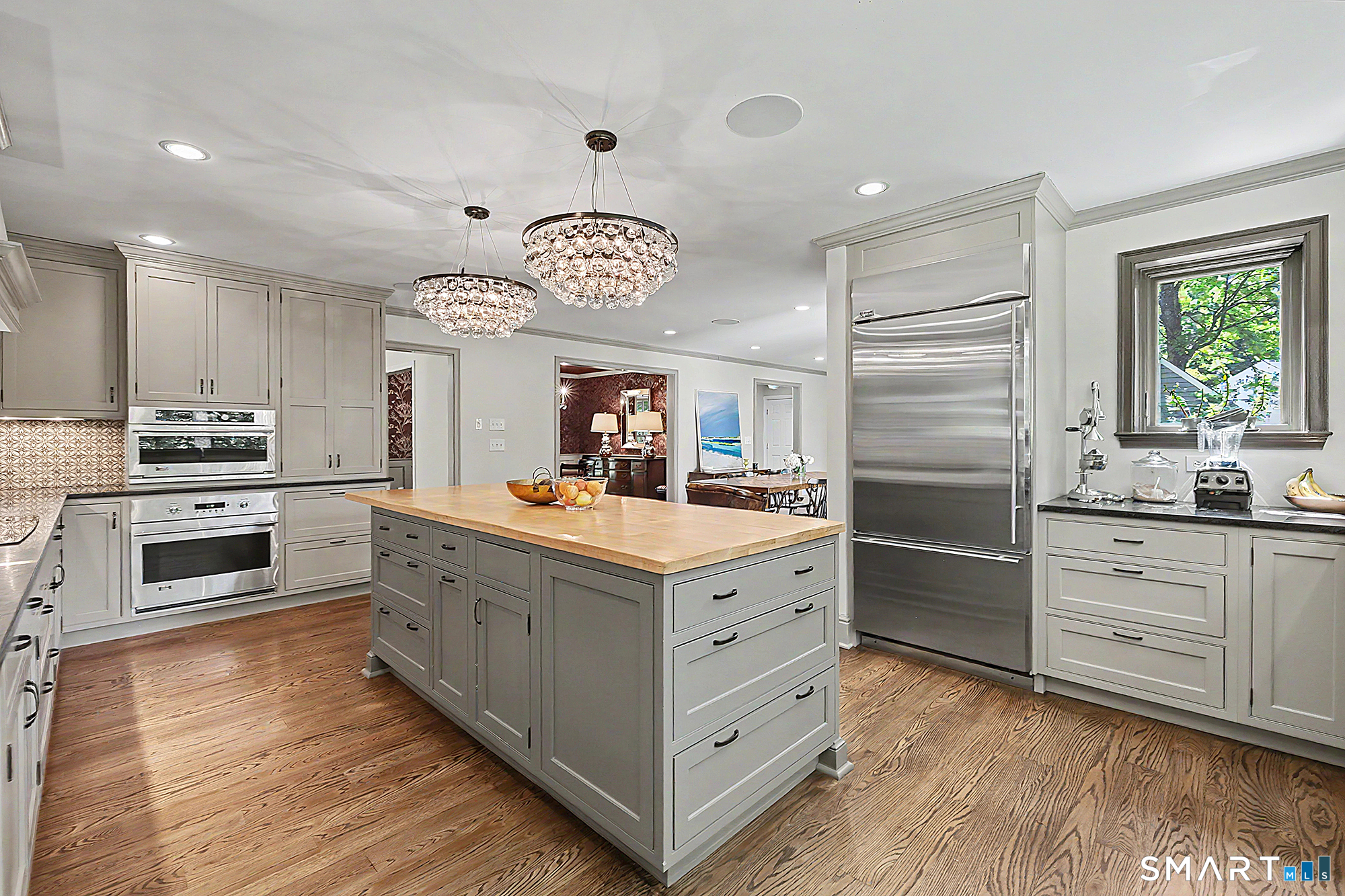 33 Hunter Lane Ridgefield, CT 06877 - Photo 7 of 39 a kitchen with stainless steel appliances kitchen island granite countertop a stove and a refrigerator