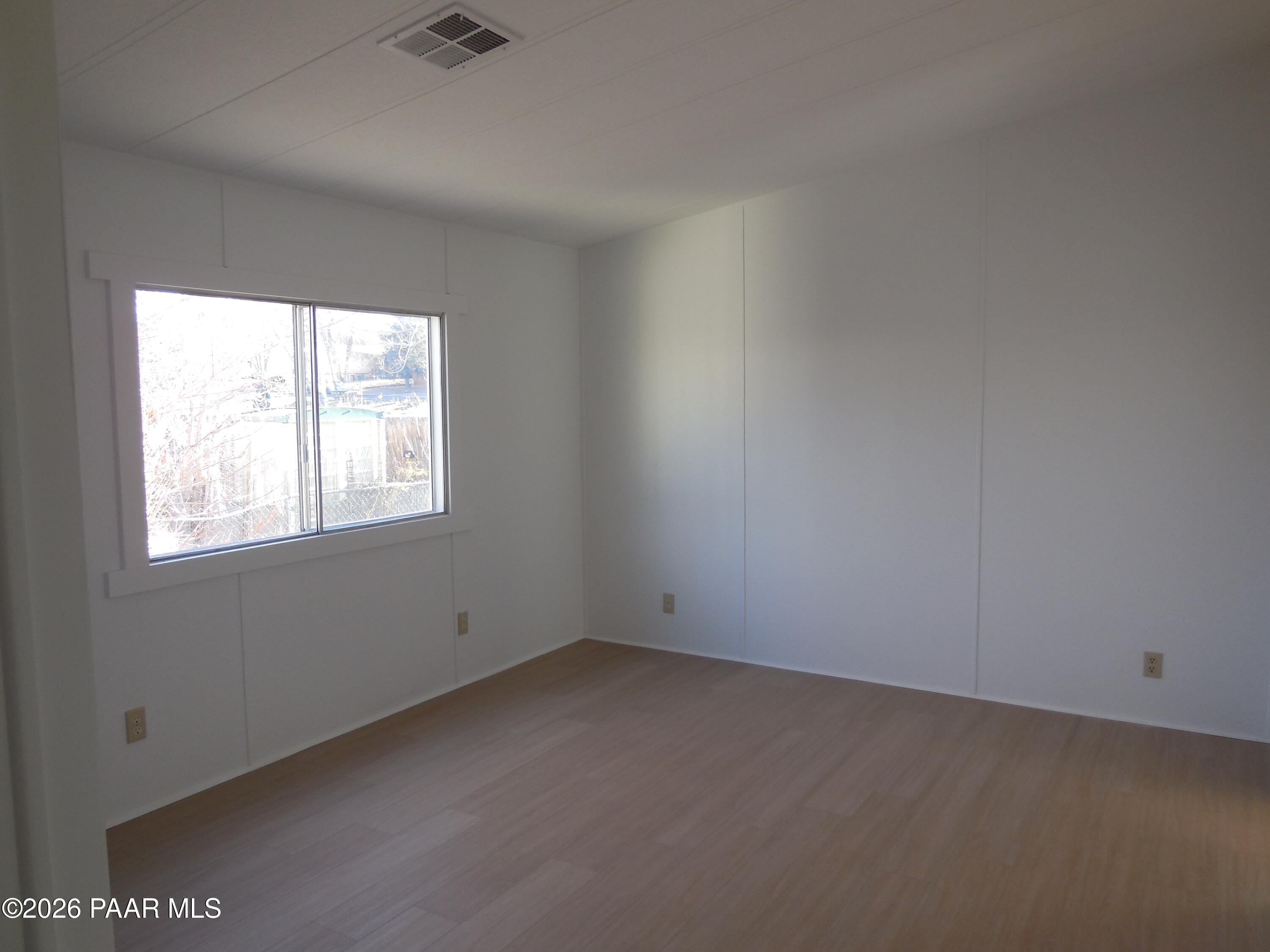 1145 Trinity Court Prescott, AZ 86301 - Photo 16 of 23 an empty room with a window